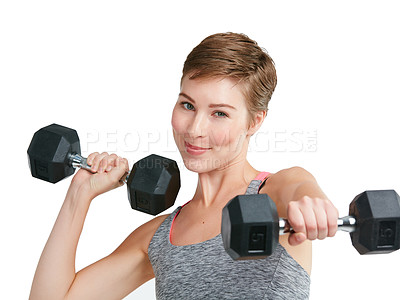Buy stock photo Studio portrait of a fit young woman working out with dumbbells against a white background