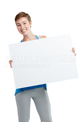 Buy stock photo Excited, showing and portrait of a woman with a board isolated on a white background in studio. Billboard, branding and girl holding a blank mockup banner with space for advertising on a backdrop