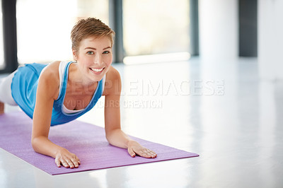 Buy stock photo Woman, fitness and plank on yoga mat for strong core, spiritual wellness or zen workout indoors on mockup. Portrait of happy female yogi with smile stretching for exercise, pilates or balance at gym