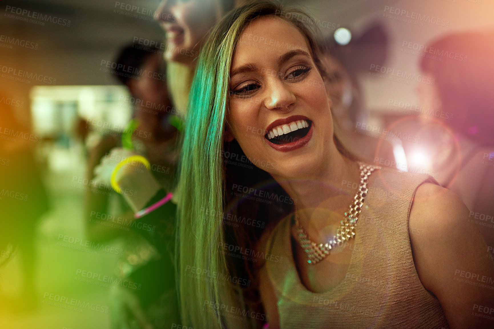 Buy stock photo Smile, lights and woman in nightclub for fun, music or happy weekend party at social event. Nightlife, energy and girl at neon dance club with lens flare, friends and celebration with youth culture.
