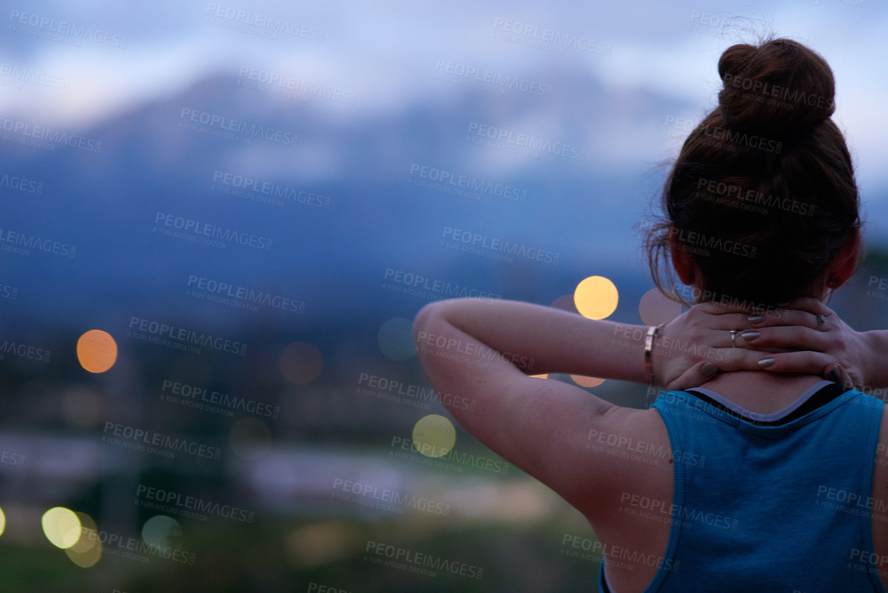 Buy stock photo Rearview shot of a young runner standing outdoors 