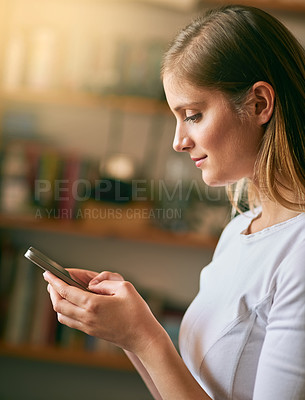 Buy stock photo Woman, home and smile with smartphone for message or text social media and dating app. Female person, profile and internet or online for entertainment, networking and communication or streaming site