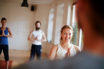Buy stock photo Cropped shot of a group of people attending a yoga class