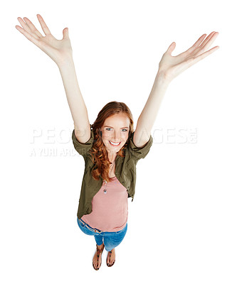 Buy stock photo Shot of a young woman with her arms raised against a white background