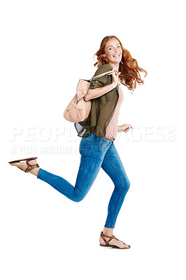 Buy stock photo Studio shot of a young woman running against a white background