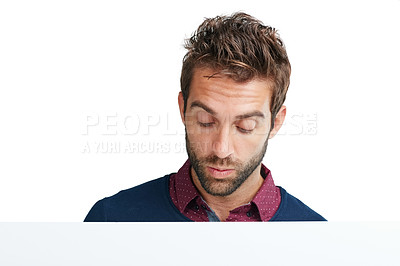 Buy stock photo Face, thinking and mockup with a man in studio isolated on a white background for branding or product placement. Idea, mock up and curious with a handsome young male on blank advertising space
