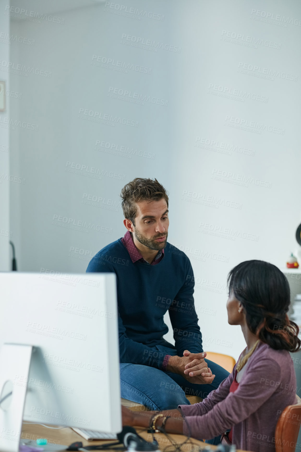 Buy stock photo Cropped shot of colleagues working together in an office