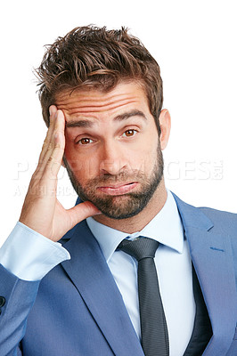 Buy stock photo Studio shot of a handsome businessman looking regretful against a white background