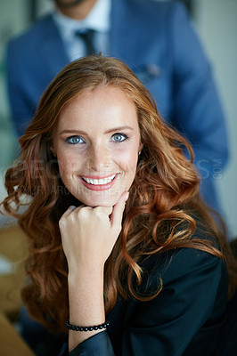 Buy stock photo Portrait of a young businesswoman sitting in an office