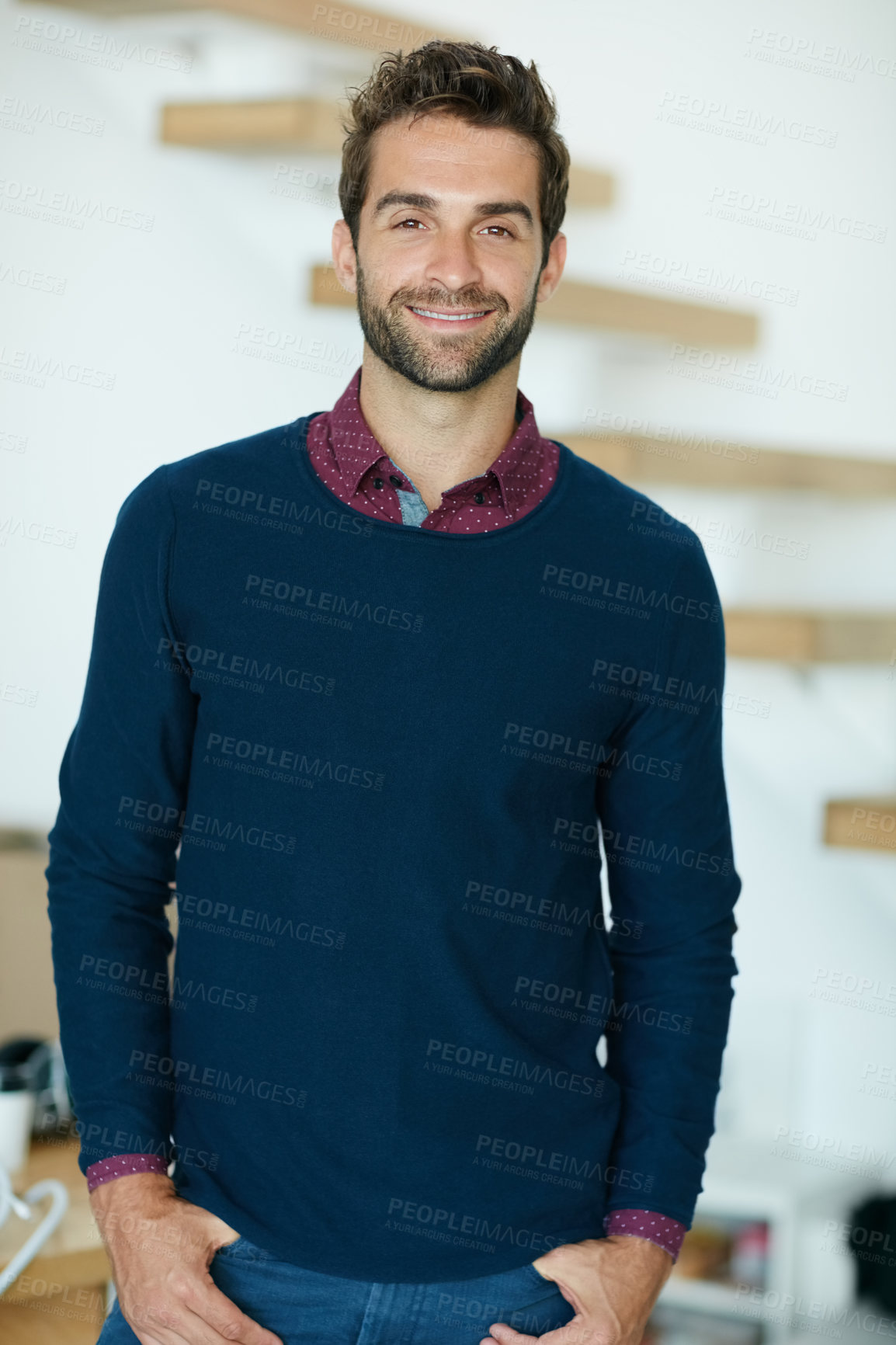 Buy stock photo Portrait of a happy creative businessman standing in his office