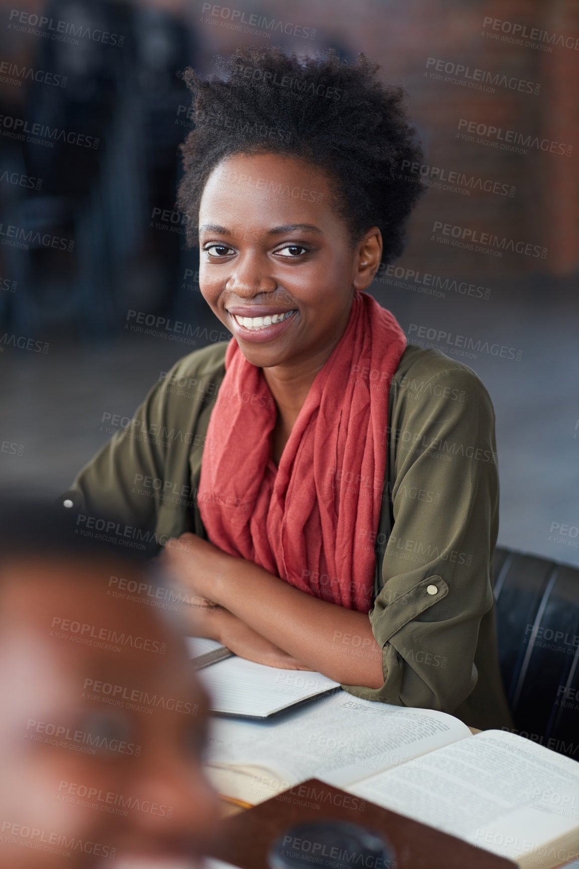 Buy stock photo Portrait of a young university student sitting in her classroom during a group project