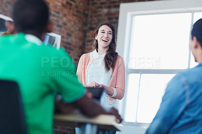 Buy stock photo Shot of young university student addressing her class during a lesson