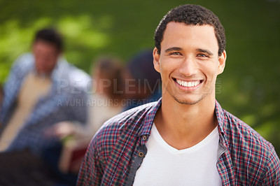 Buy stock photo Cropped portrait of a happy young man on campus