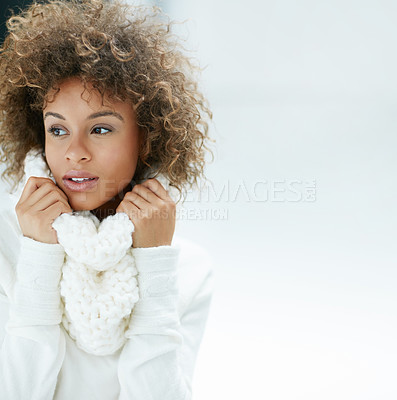 Buy stock photo Shot of an attractive young woman dressed in winter attire