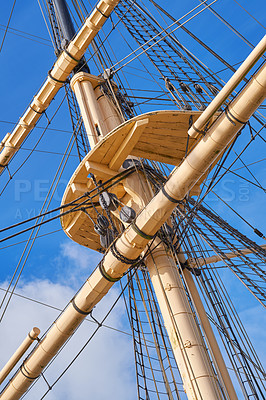 Buy stock photo Blue sky, history and travel with mast for sailing outdoor in nature from below for Danish heritage. Adventure, engineering and rope with flagpole on boat or ship for holiday or vacation at sea