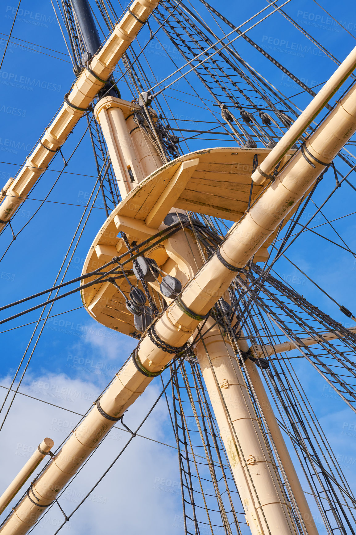 Buy stock photo Blue sky, history and travel with mast for sailing outdoor in nature from below for Danish heritage. Adventure, engineering and rope with flagpole on boat or ship for holiday or vacation at sea