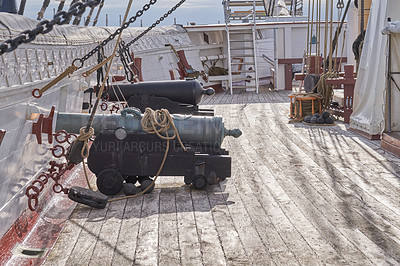 Buy stock photo Museum, ship and cannon on deck for travel, sightseeing and landmark vessel in Denmark. Sailboat, history and architecture with war gun for tourist attraction, exhibition and transportation on ocean