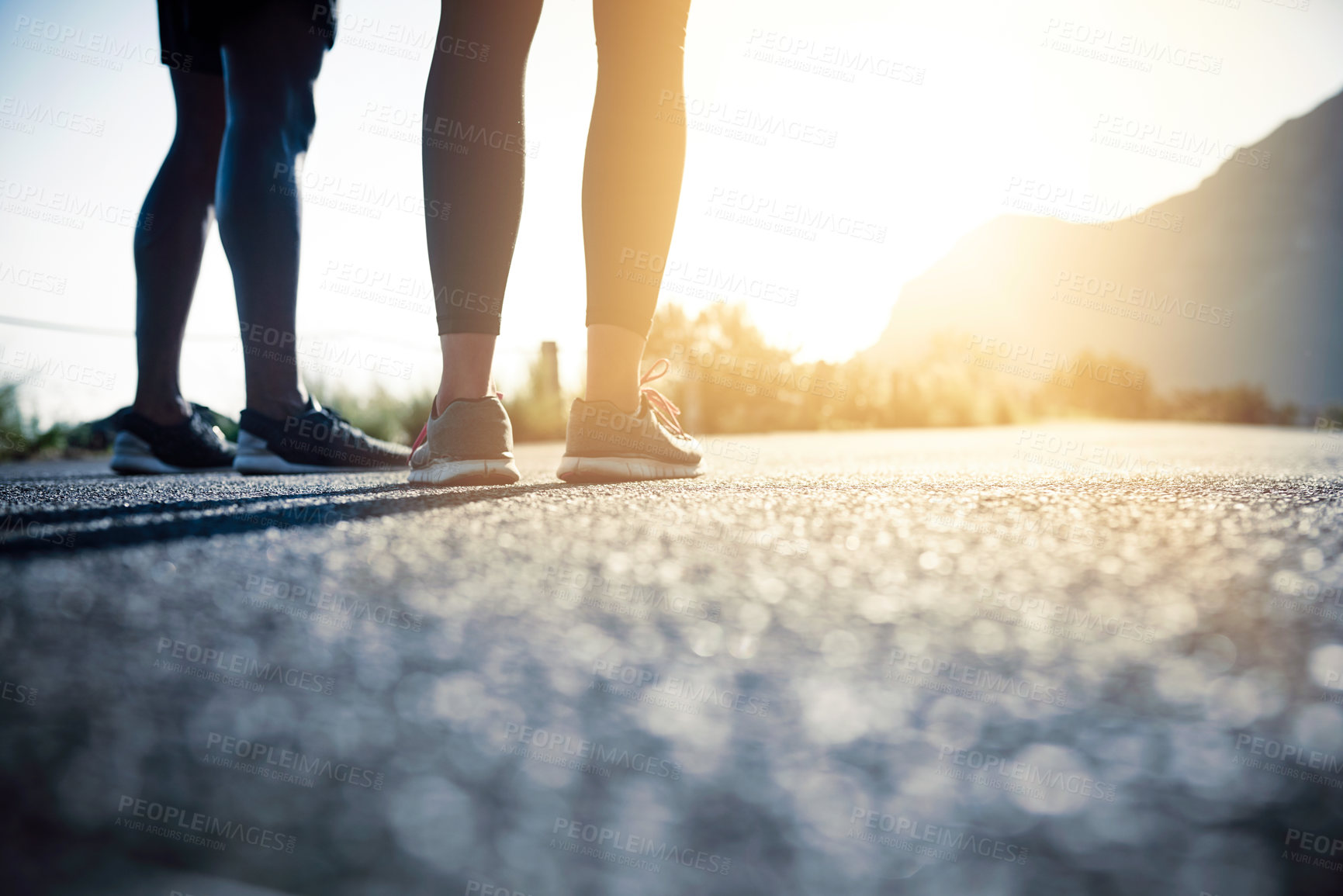 Buy stock photo Fitness, couple and legs with street for running, exercise or outdoor training on asphalt in sunshine. Active, man and woman with sneakers or shoes for sprint, marathon or challenge on road in nature