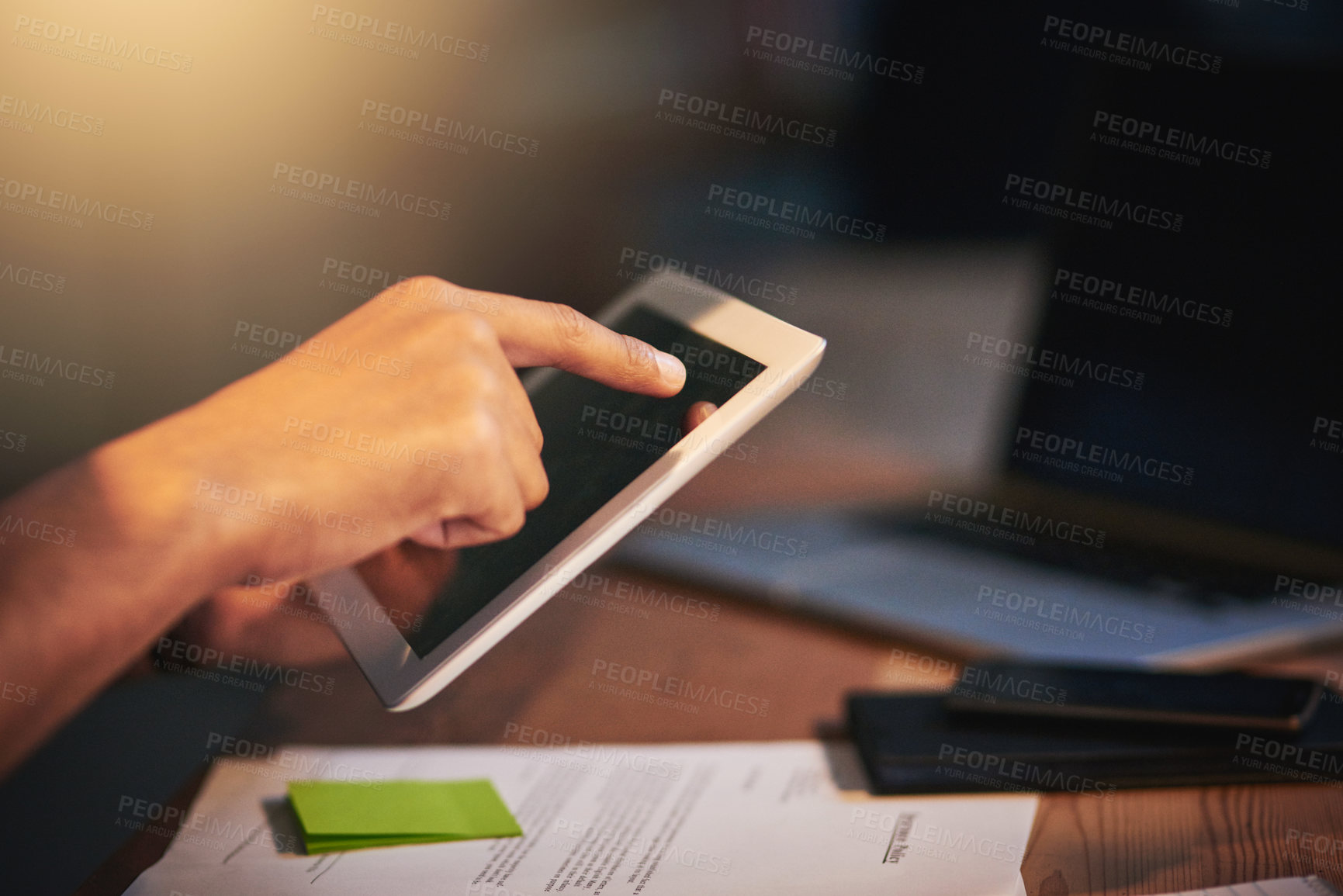 Buy stock photo Business person, hands and night with tablet for research, browsing or UI interaction at office. Closeup, employee or user working late with touch or technology for UX, software or app at workplace