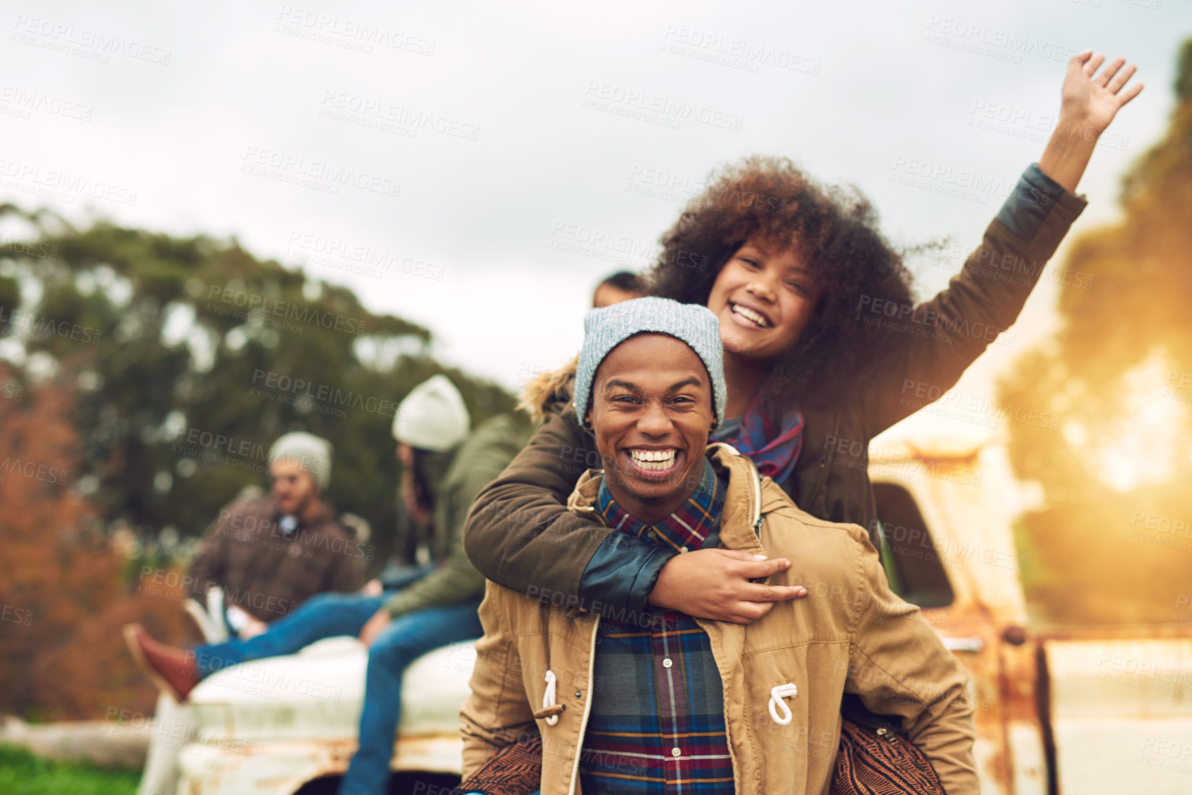 Buy stock photo Smile, african couple portrait and piggyback with love, bonding and fun on holiday with winter date. Happy, man and woman with vacation with park, care and freedom in nature, forest or woods travel