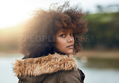 Buy stock photo Girl, outdoor and portrait on holiday by lake, afro and travel for vacation, nature and getaway in sunshine. Woman, person and curly hair with view of river, water and morning on adventure in Brazil