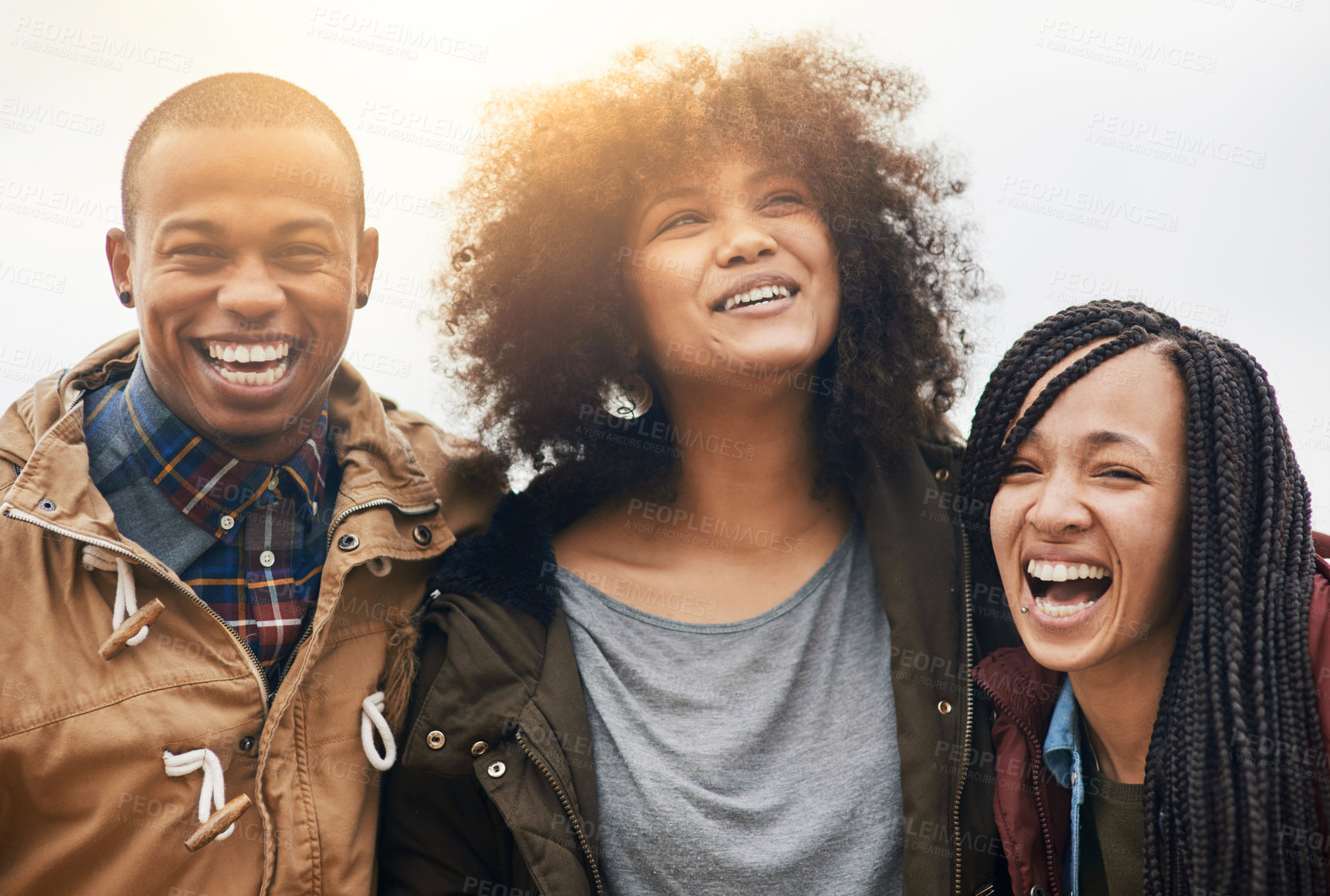 Buy stock photo Portrait of a group of happy friends posing together outside