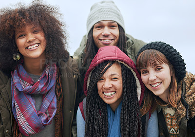 Buy stock photo Portrait of a group of happy friends posing together outside