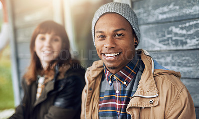 Buy stock photo Portrait of two friends relaxing on the porch of a fishing cabin on a weekend getaway