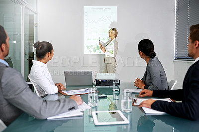 Buy stock photo Presentation, business people and leader with projector screen, graphs for planning meeting and information in conference room. Data analysis, statistics and research for corporate project with team