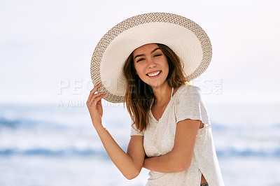 Buy stock photo Portrait, smile and woman with sun hat at beach for summer travel, vacation and tourism in Miami. Outdoor, happy and relax by ocean with peace for adventure, weekend trip and confidence on holiday