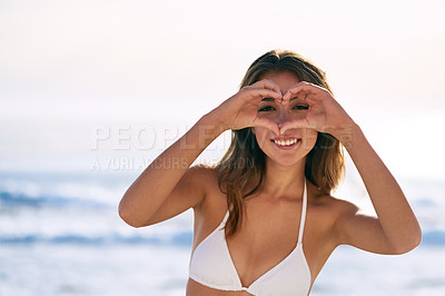 Buy stock photo Heart, hands and portrait of woman at beach for summer holiday, island trip and adventure in Bali. Happy, emoji and relax by ocean with love for tourism, weekend travel and finger shape on vacation