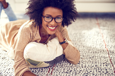Buy stock photo Portrait, black woman and relax on floor at home on carpet for break or peace with smile for weekend to chill on living room. Happy, African and female person with glasses for resting at apartment