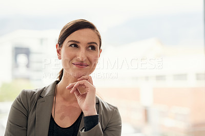 Buy stock photo Cropped shot of a confident young businesswoman standing in an office