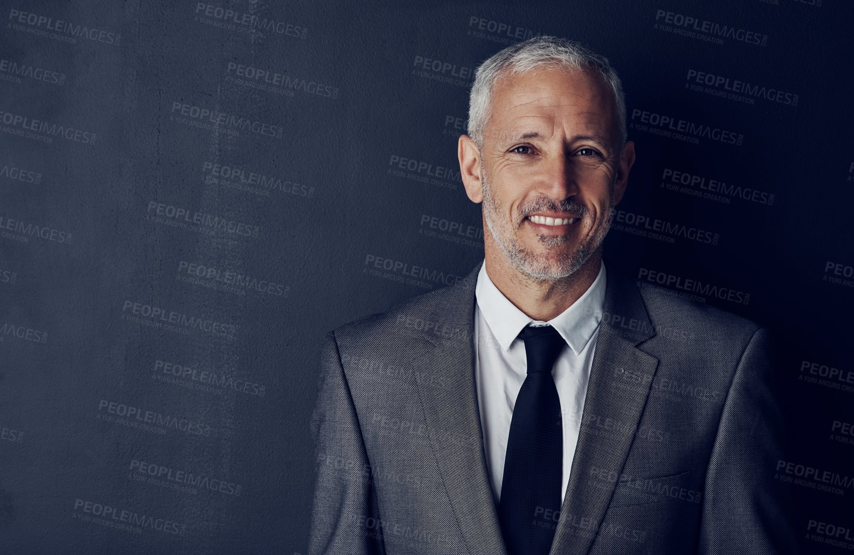 Buy stock photo Mockup, confidence and smile, portrait of businessman in suit and pride on dark background. Boss, ceo and business owner with professional career, happy senior director with executive management job.