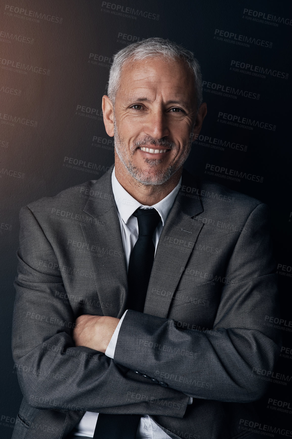 Buy stock photo Portrait, smile and businessman with confidence, lawyer or attorney on dark background in studio. Proud boss, ceo and professional business owner, happy senior director at law firm with arms crossed.