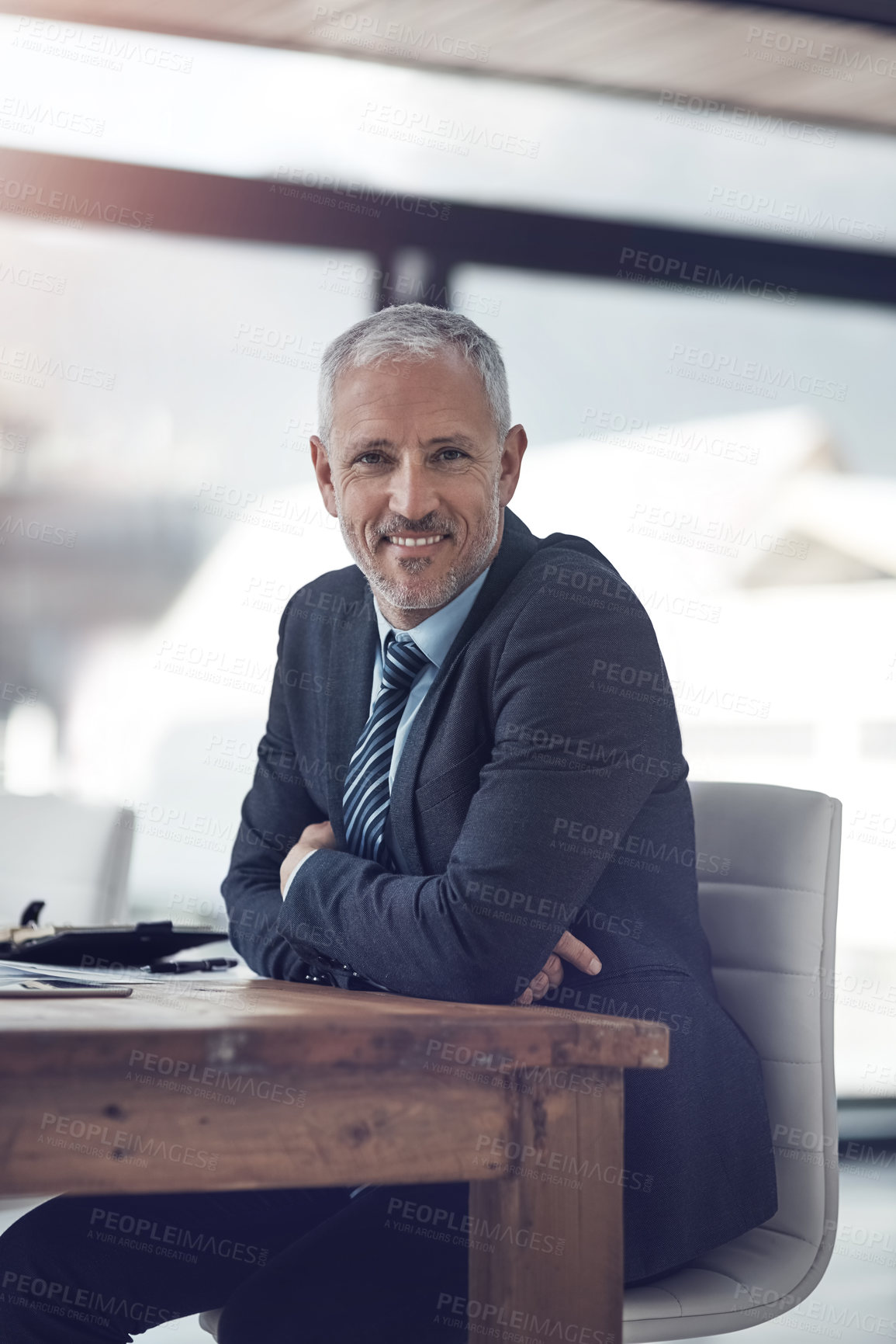 Buy stock photo Mature, businessman and portrait with pride, smiling and confidence in office or company. Male person, arms crossed and happiness at desk as accountant or professional for financial agency or banking