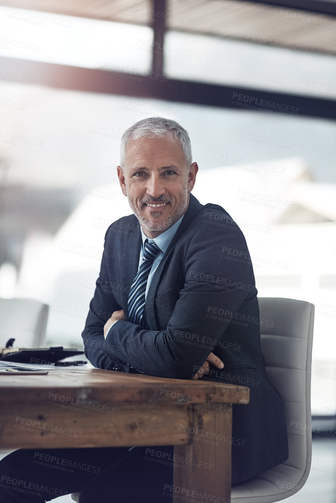 Buy stock photo Mature, businessman and portrait with pride, happiness and confidence in office or company. Male person, arms crossed and smiling at desk as accountant or professional for financial agency or banking