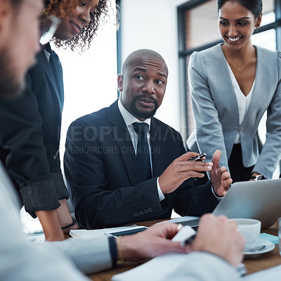 Buy stock photo Meeting, discussion and black man with team with laptop in office for brainstorming idea, planning and collaboration. Corporate, business and men and women working on report, project and proposal