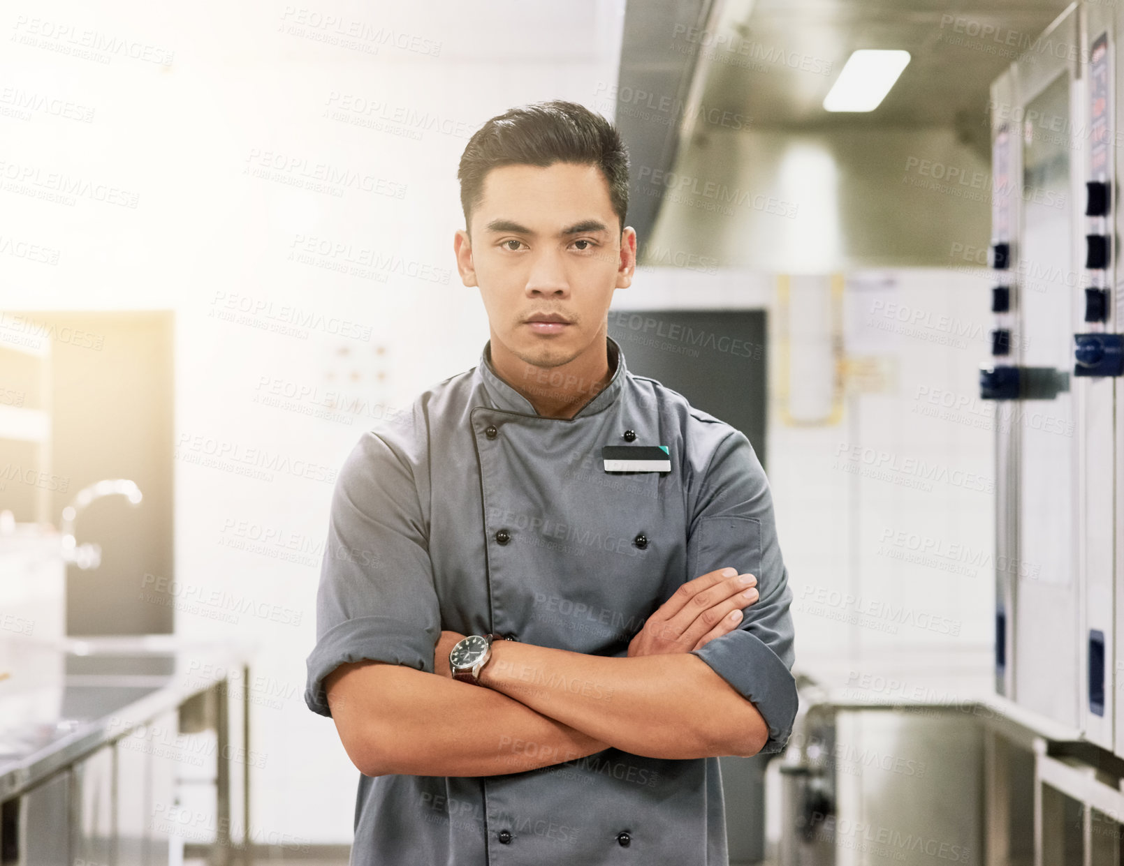 Buy stock photo Asian man, portrait and chef with arms crossed in kitchen for professional cooking, hospitality or confidence. Male person, face and fine dining restaurant or service in food industry, career or work