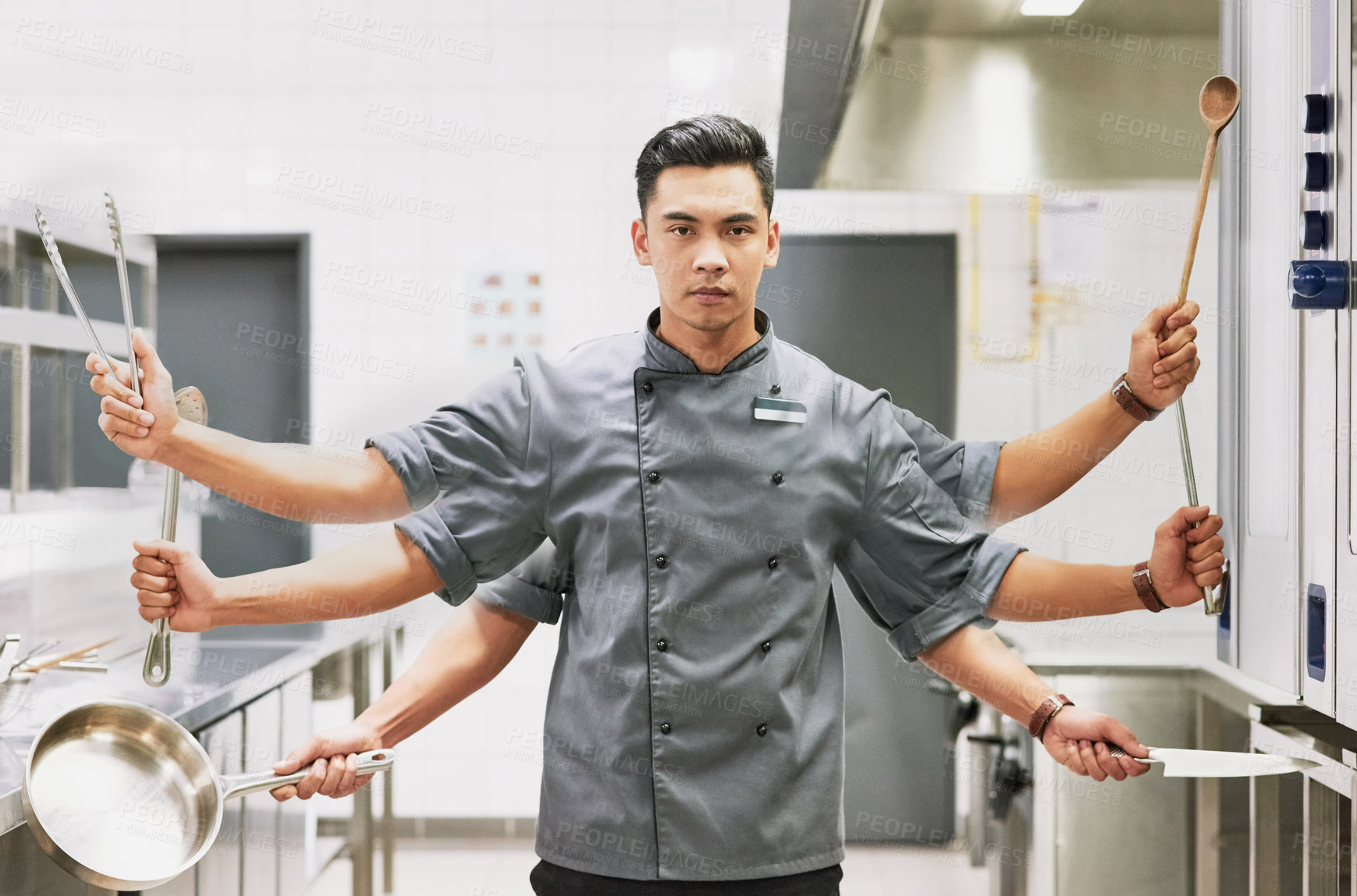 Buy stock photo Digitally altered portrait of a chef holding various cooking utensils in his kitchen