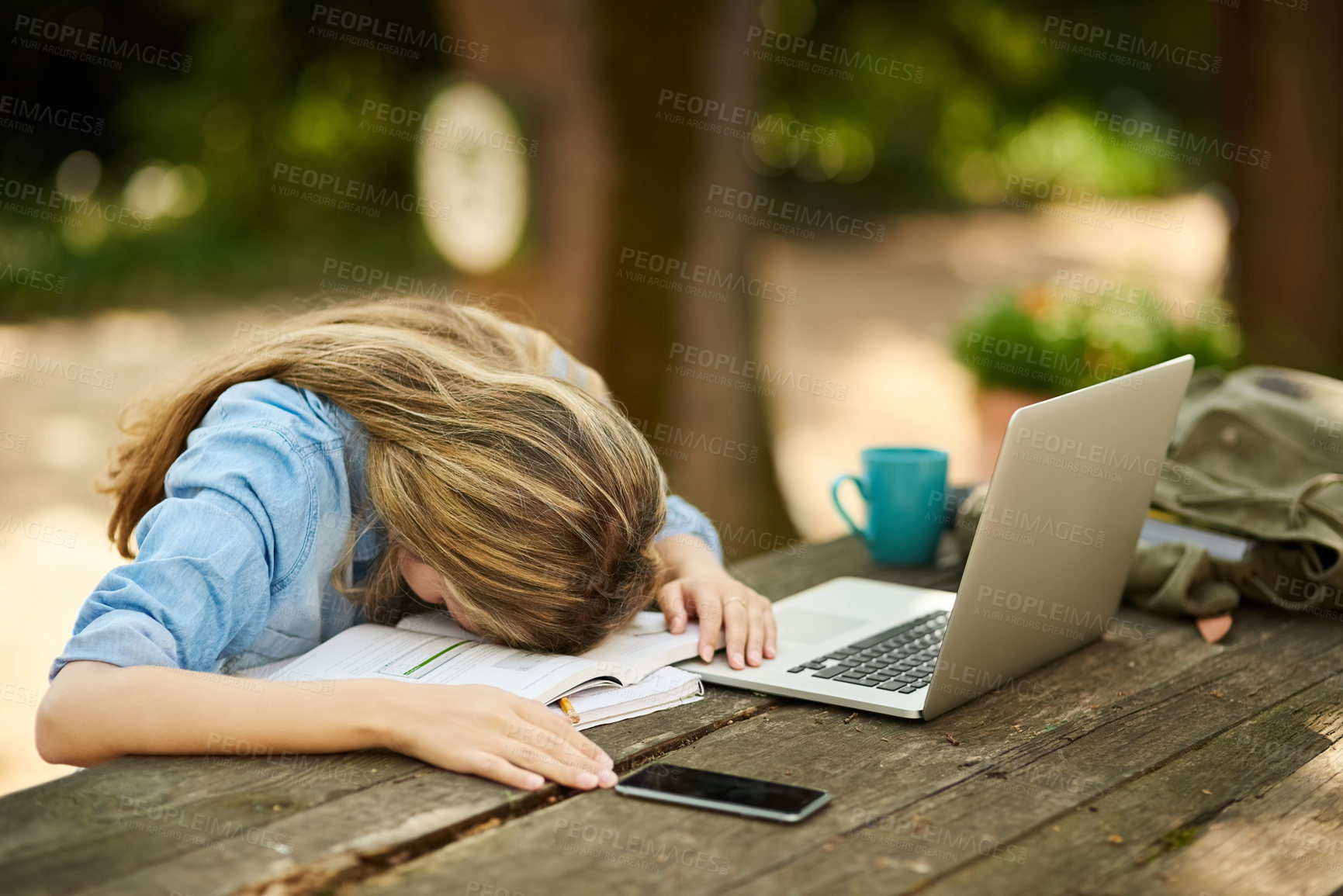 Buy stock photo Student, girl and laptop in burnout, tired or sleeping with books, cellphone and outdoor for elearning. Female person, tech and break in education, study and university in college or school.