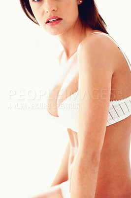 Buy stock photo Mid section of a sexy busty woman against white background