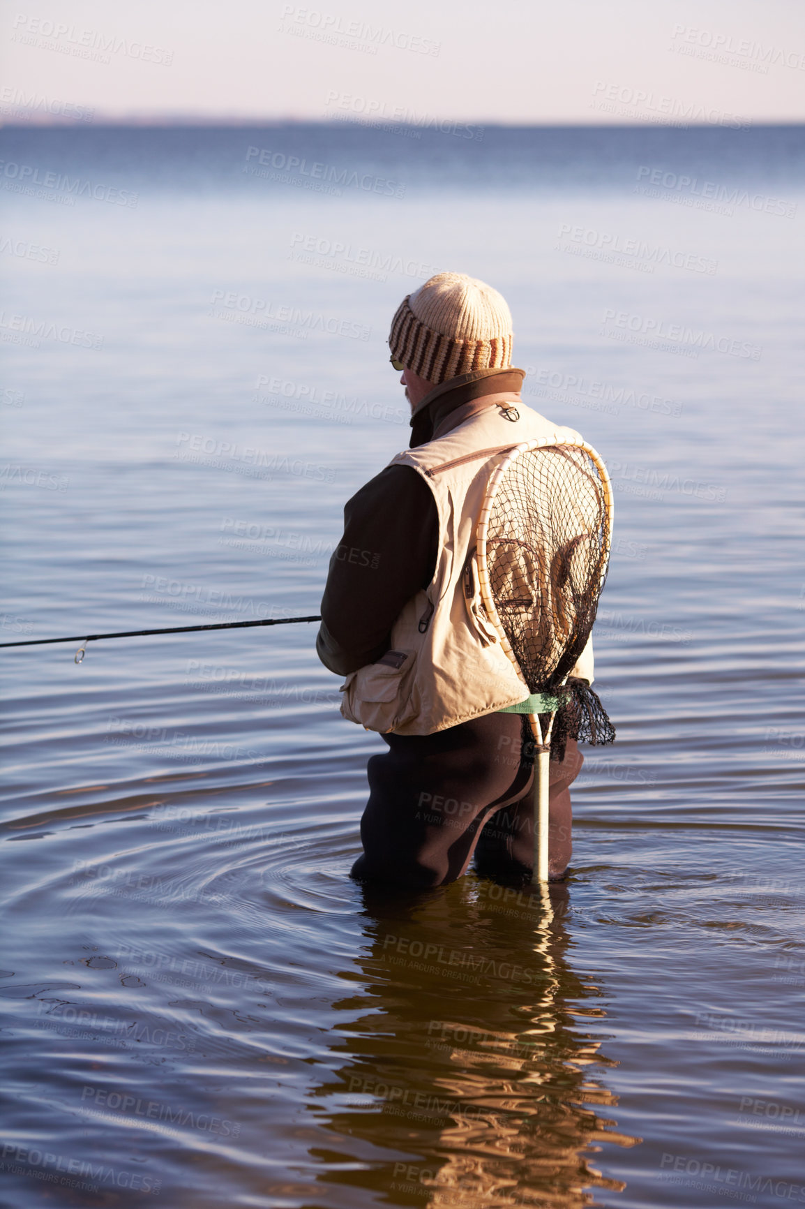 Buy stock photo Nature, relax and fishing with man in lake for summer break, hobby and peace on vacation. Sports, casting and rod with fisherman or person standing in fresh water pond or river during a holiday