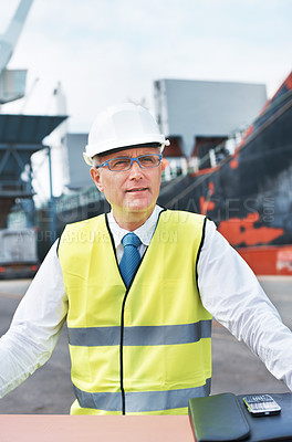 Buy stock photo A confident dock worker thinking while looking away in contemplation