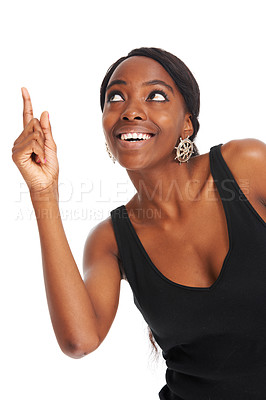 Buy stock photo Happy, advertising and pointing with a black woman in studio isolated on a white background for information. Smile, marketing and hands gesture with a young female brand ambassador showing space