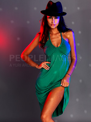 Buy stock photo Woman, dark background and party dress to celebrate in disco, night club or new years evening event. Portrait of female studio model in green clothes, hat or cocktail style clothes, fashion or beauty