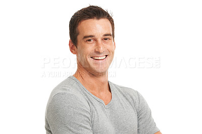 Buy stock photo Portrait, smile and a confident man in studio isolated on a white background for fashion or style. Happy, wellness and satisfaction with a young model looking relaxed in a casual clothes outfit