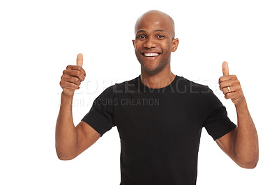 Buy stock photo Studio portrait, man and thumbs up with happiness for  winner, success and showing yes with white background. Black model, casual t-shirt and agreement with vote emoji, positive review and mockup