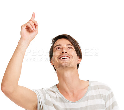 Buy stock photo Happy man, smile and pointing up in studio for idea, excited and surprise with mockup advertisement. Model, hand gesture and marketing for deal or promotion, announcement and white background 