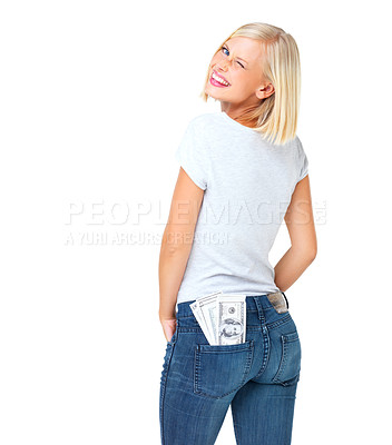 Buy stock photo Portrait, woman and cash in pocket, wink and casual outfit with female isolated on white studio background. Face, lady and happy girl with money, finance and wealth with dollars, winning and backdrop